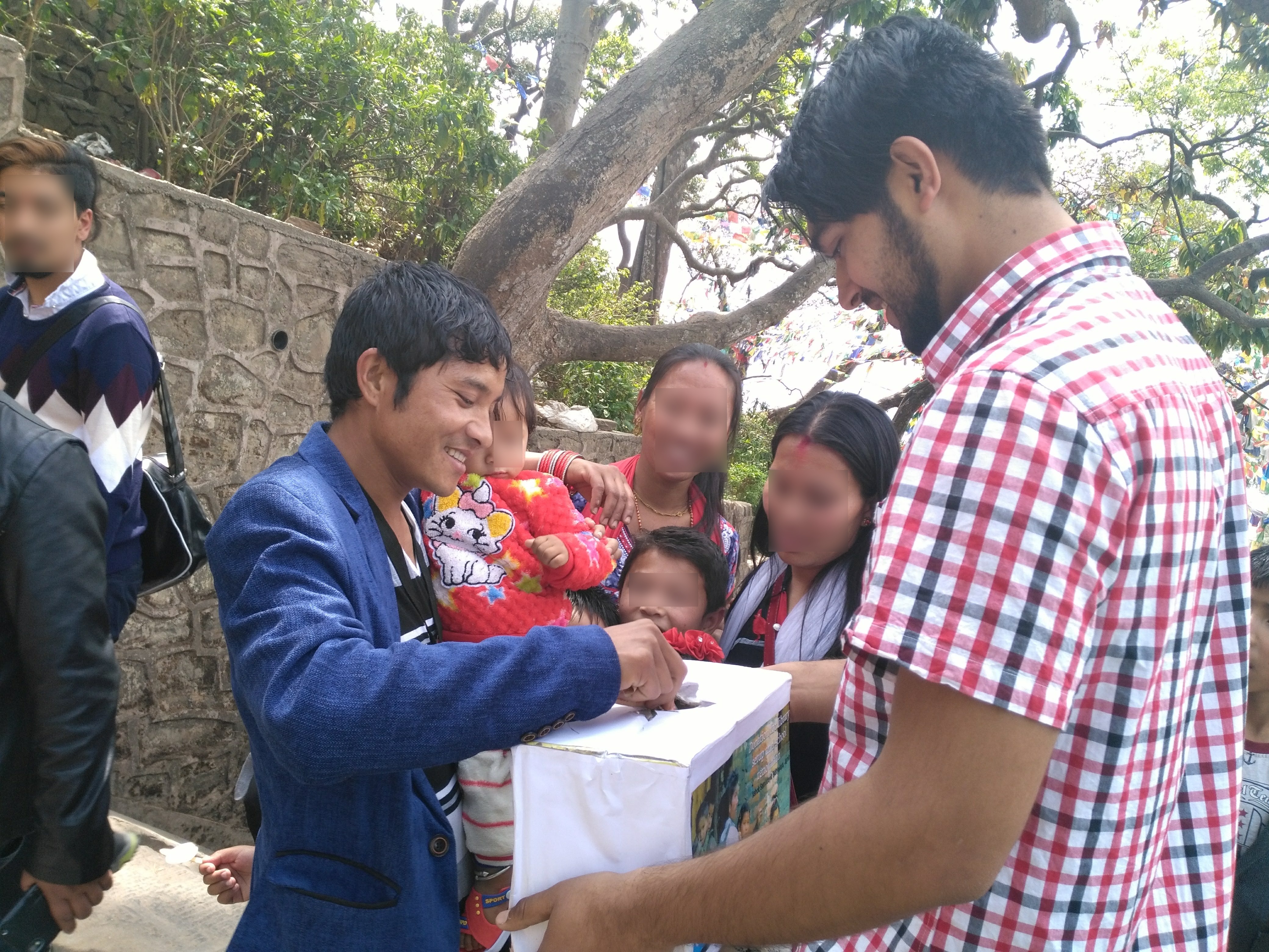 Donor contributing to the school library fundraising effort
