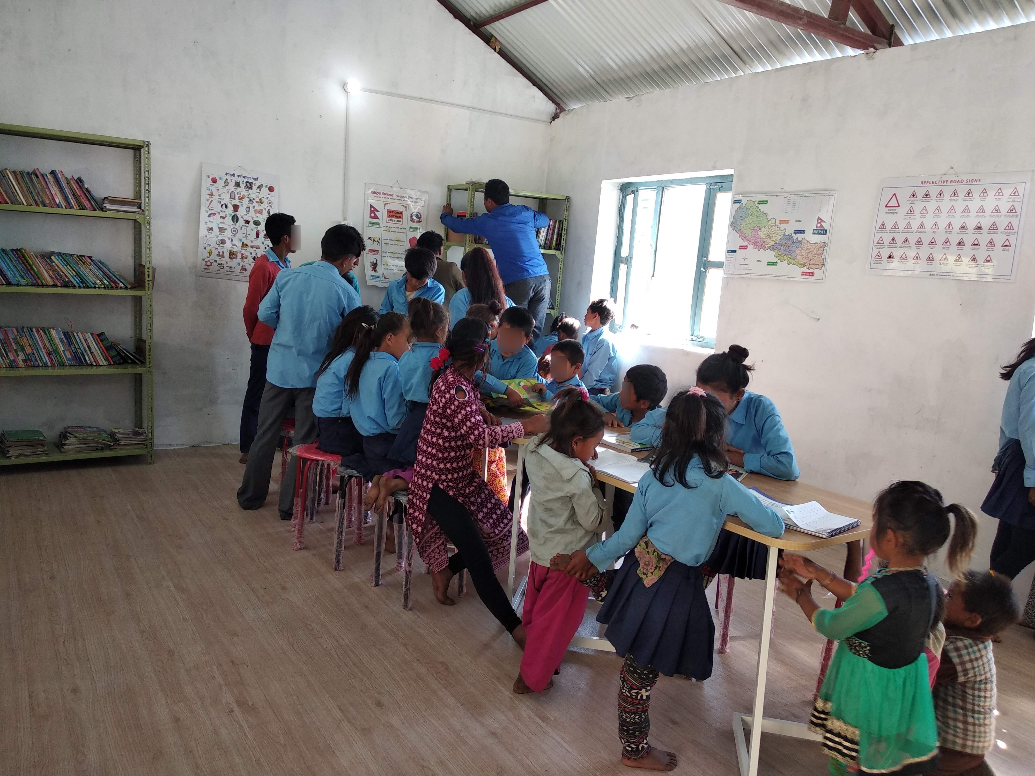 Students using a completed library space in Rasuwa
